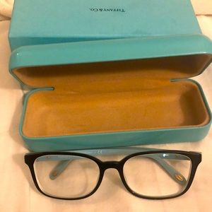 Tiffany seeing glasses in perfect condition. Need to switch prescriptions out.